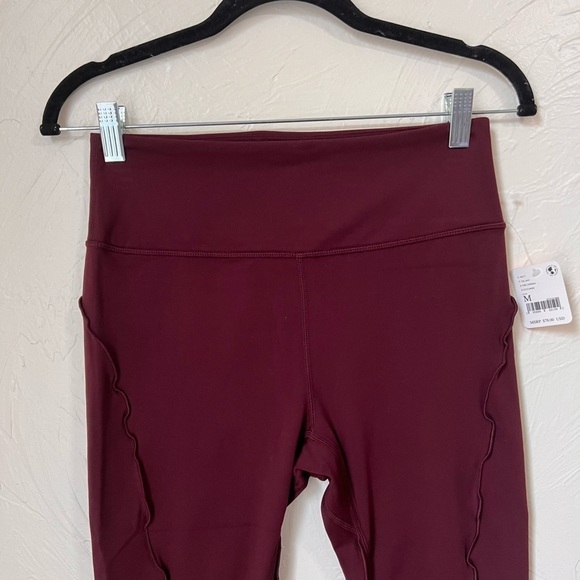 NWT Free People Movement high rise ruffle leggings fig jam size Medium - Picture 2 of 8
